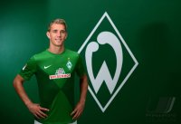 Fussball 1. Bundesliga, Saison 2012/2013, Werder Bremen: Nils Petersen im exklusiven Pressefoto ULMER Fotoshooting