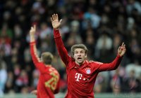 Fussball 1. Bundesliga, Saison 2011/2012:  JUBEL Thomas Mueller (FC Bayern Muenchen)