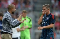 Fussball International Audi Cup 2013: Bastian Schweinsteiger (FC Bayern Muenchen) und Trainer Pep Guardiola (FC Bayern Muenchen)