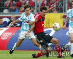 Fussball 1. Bundesliga: Leverkusen - 60 Muenchen, Zweikampf