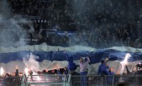 Fussball 1. Bundesliga, Saison 2011/2012: FC Schalke 04  Fankurve mit einem Bengalischen Feuer
