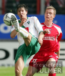 Fussball 1. Bundesliga: Mainz - Bremen, Zweikampf