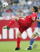 Fussball 1. Bundesliga: Bayern, DEMICHELIS Einzelaktion am Ball