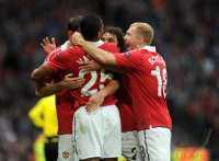 Fussball CHL  Saison 2010/2011:  Jubel mit Antonio Valencia , Rafael, Paul Scholes  (v. li., Manchester United FC)