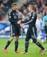 Fussball CHL&Atilde; Saison 12/13:  Thomas Mueller und Arjen Robben (v. li., FC Bayern Muenchen)