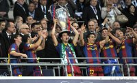Fussball Champions League Finale 2011: JUBEL mit Pokal Lionel Messi, Javier Mascherano , Sergio Busquets , Pedro Rodriguez  (v. li., Barca)