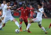 Fussball U21-EURO 2011 FINALE:  Alberto Botia (li, Spanien) gegen Innocent Emeghara (Mitte, Schweiz) gegen Thiago Alcantara (re, Spanien)