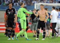 Fussball CHL  Saison 2011/2012:  Daniel van Buyten , Torwart Manuel Neuer , Bastian Schweinsteiger (v. li., FC Bayern Muenchen)