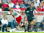 Fussball 1. Bundesliga: Koeln - Wolfsburg, Zweikampf