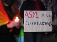 Tuebingen; Stille Mahnwache fuer Frieden auf dem Tuebinger Holzmarkt