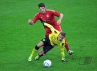 Fussball 1. Bundesliga, Saison 2011/2012: Mario Gomez (li, FC Bayern Muenchen) gegen Mario Goetze (Borussia Dortmund)