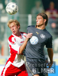 Fussball 1. Bundesliga: Koeln - Wolfsburg, Zweikampf