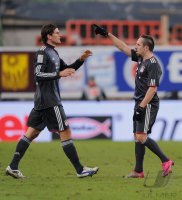 Fussball 1. Bundesliga  Saison 2010/2011: (v. li.) Bayern Jubel mit Mario Gomez mit Franck Ribery