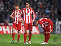 Fussball 1. Bundesliga : (v. li) Bayern Enttaeuschung mit Thomas Mueller, Mario Gomez, Bastian Schweinsteiger