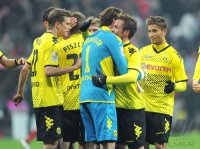Fussball 1. Bundesliga, Saison 2011/2012:  Kevin Grosskreutz , Torwart Roman Weidenfeller , Mario Goetze, Moritz Leitner (v. li., Borussia Dortmund)