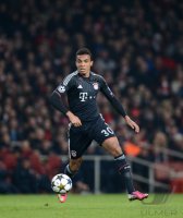 FUSSBALL INTERNATIONAL CHL ACHTELFINALE 12/13: Luiz Gustavo (FC Bayern Muenchen)