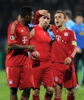 Fussball DFB Pokal 11/12 : David Alaba, Franck Ribery, Rafinha (v. li., FC Bayern Muenchen)