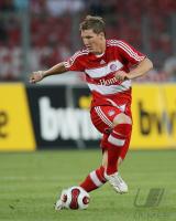 Fussball  Bastian Schweinsteiger  FC Bayern Muenchen