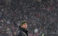 Fussball 1. Bundesliga : Trainer Juergen Klopp im Schneetreiben (Borussia Dortmund)