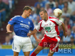 FUSSBALL 1. Bundesliga: Schalke - Koeln, Zweikampf