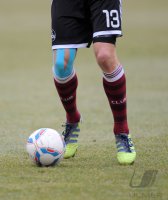 Fussball 1. Bundesliga, Saison 2011/2012:  Fussballschuhe von ADIDAS mit dem TORFABRIK Spielball