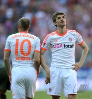 Fussball 1. Bundesliga, Saison 2011/2012:  Thomas Mueller (re.) mit Arjen Robben (FC Bayern Muenchen)
