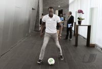 FIFA Praesident Joseph S. Blatter (Schweiz) trifft Usain Bolt (Jamaika)