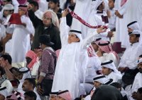 Fussball AFC Asian Cup 2011 Eroeffnungsspiel:  Katarische Fans in Tracht