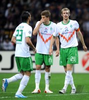 Fussball Champions League  Saison 2010/2011: Hugo Almeida, Sebastian Proedl, Per Mertesacker (v. li., SV Werder Bremen)