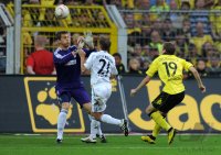 Fussball 1. Bundesliga : Hans Joerg Butt (li., FC Bayern Muenchen) gegen Philipp Lahm (FC Bayern Muenchen) gegen Kevin Grosskreutz (re, Borussia Dortmund)