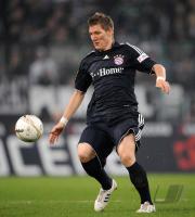 FUSSBALL 1. BUNDESLIGA: Bayern, SCHWEINSTEIGER Einzelaktion