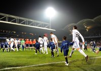 Fussball CHL  Saison 2010/2011: (v. li.) Enttaeuschung Mesut Oezil mit Sergio Ramos (Real Madrid)