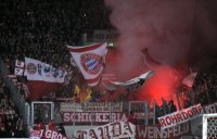 Fussball DFB Pokal 10/11 :  Bayern Fankurve mit einem Bengalischen Feuer