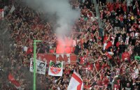 Fussball 1. Bundesliga, Saison 2011/2012:   FC Bayern Muenchen Fans mit einem Bengalischen Feuer
