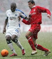 Fussball 1. Bundesliga: Bayern Muenchen - Hamburger SV, Zweikampf