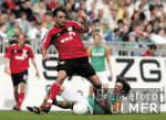 Fussball 1. Bundesliga: Bremen - Leverkusen, Zweikampf
