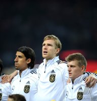 Fussball International EM 2012-Qualifikation:  Sami KHEDIRA, Per MERTESACKER, Toni KROOS (v.li., Deutschland)