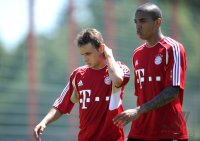 Fussball 1. Bundesliga: Rafinha, Luiz Gustavo (v. li., FC Bayern Muenchen)