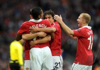 Fussball CHL  Saison 2010/2011:  Jubel mit Antonio Valencia , Rafael, Paul Scholes  (v. li., Manchester United FC)