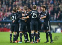 Fussball CHL&Atilde; Saison 12/13:  Philipp Lahm, Thomas Mueller und Javi , Javier Martinez  (v. li., FC Bayern Muenchen)