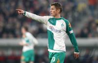 Fussball 1. Bundesliga: Werder, ROSENBERG zeigend
