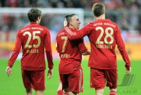 Fussball 1. Bundesliga, Saison 2011/2012: Thomas Mueller , Franck Ribery , Holger Badstuber (v. li., FC Bayern Muenchen)
