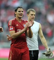 Fussball 1. Bundesliga, Saison 2011/2012:  Daniel van Buyten , Torwart Manuel Neuer (v. li., FC Bayern Muenchen)