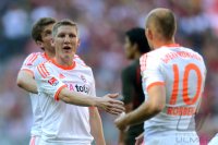Fussball 1. Bundesliga, Saison 2011/2012:  Bastian Schweinsteiger (li.) mit Arjen Robben (FC Bayern Muenchen)