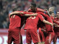 Fussball CHL  Saison 2011/2012:  JUBEL Jerome Boateng, Mario Gomez, David Alaba (v.li., FC Bayern Muenchen)