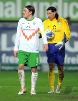 Fussball 1. Bundesliga, Saison 2011/2012: Clemens Fritz (li.) mit Torwart Tim Wiese (SV Werder Bremen)