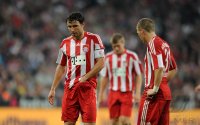 Fussball 1. Bundesliga Saison 2010/2011: Mark van Bommel, Bastian Schweinsteiger (v.li., FC Bayern Muenchen)