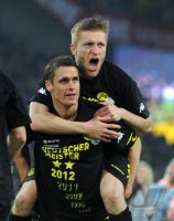 Fussball 1. Bundesliga : Sebastian Kehl oben auf Jakub  KUBA Blaszczykowski (Borussia Dortmund)