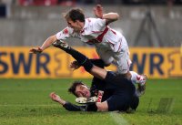 Fussball 1. Bundesliga : Foul von Georg Niedermeier (re, VfB Stuttgart) gegen Milivoje Novakovic (li, 1. FC Koeln)  fuehrt zum Elfmeter