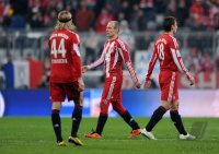 Fussball 1. Bundesliga : Enttaeuschung bei Anatoliy Tymoshchuk, Arjen Robben, Miroslav Klose (v. li., FC Bayern Muenchen)